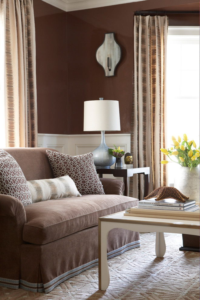 This is an example of a beach style living room in New York with brown walls.