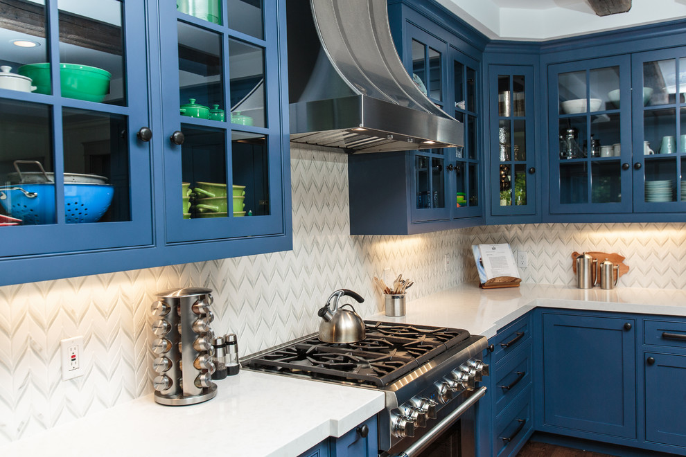 Inspiration for a large country eat-in kitchen in Boston with a farmhouse sink, beaded inset cabinets, blue cabinets, quartz benchtops, mosaic tile splashback, stainless steel appliances, dark hardwood floors and with island.