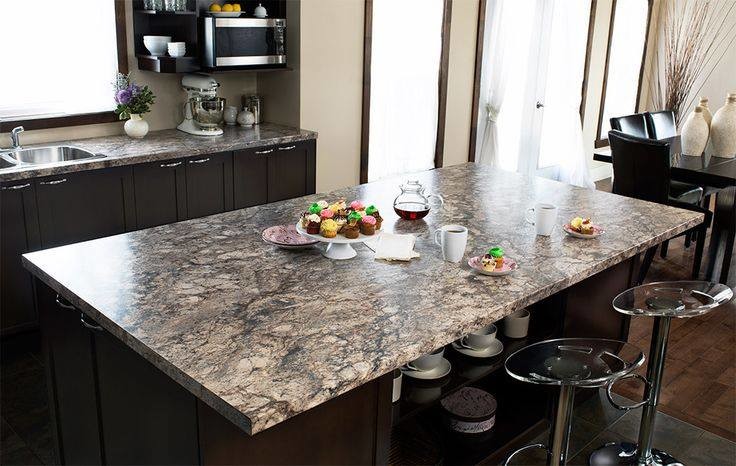 Mid-sized transitional l-shaped eat-in kitchen photo with a double-bowl sink, shaker cabinets, dark wood cabinets, granite countertops and an island