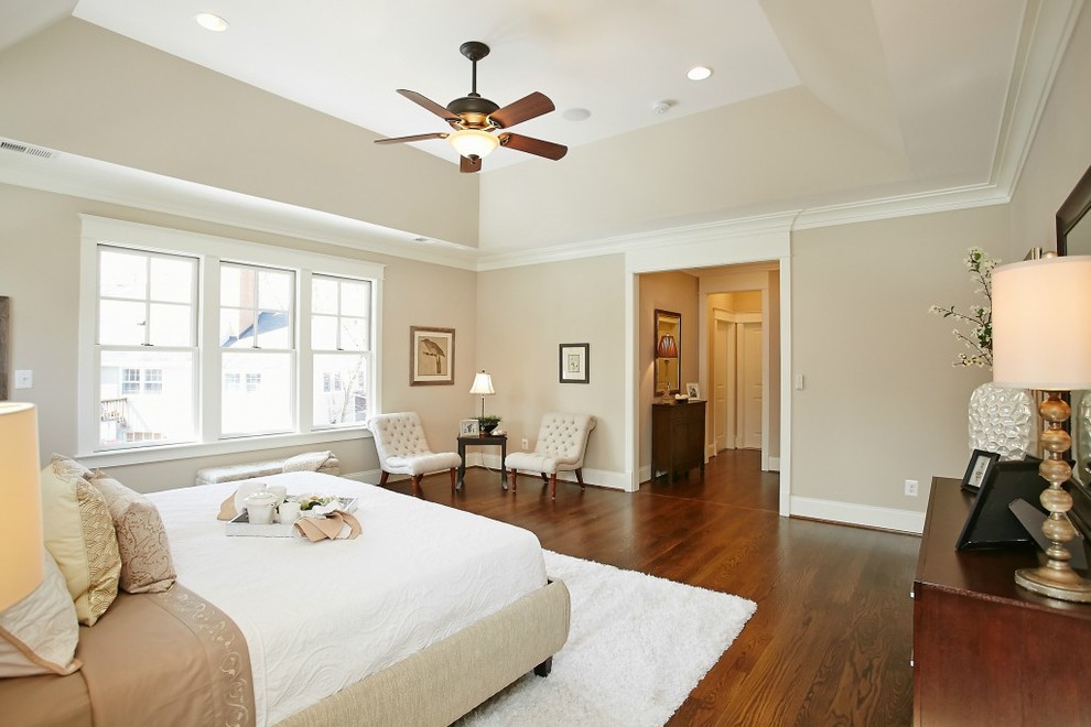 This is an example of a large arts and crafts master bedroom in DC Metro with beige walls, ceramic floors, no fireplace and beige floor.
