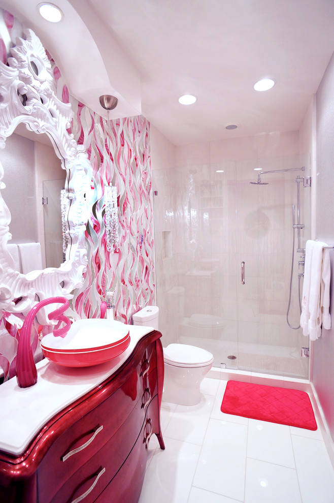 Photo of a large contemporary bathroom in Austin with a vessel sink, red cabinets, an alcove shower, white tile, marble benchtops, a one-piece toilet, glass tile, multi-coloured walls and marble floors.