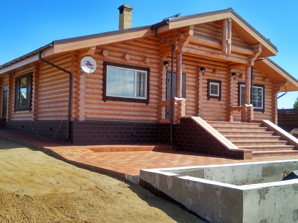 плитка stroeher на фасаде деревянного дома