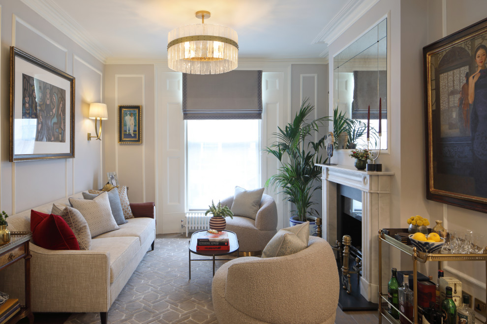 Traditional enclosed living room in London with grey walls, dark hardwood flooring, a standard fireplace, a stone fireplace surround and brown floors.