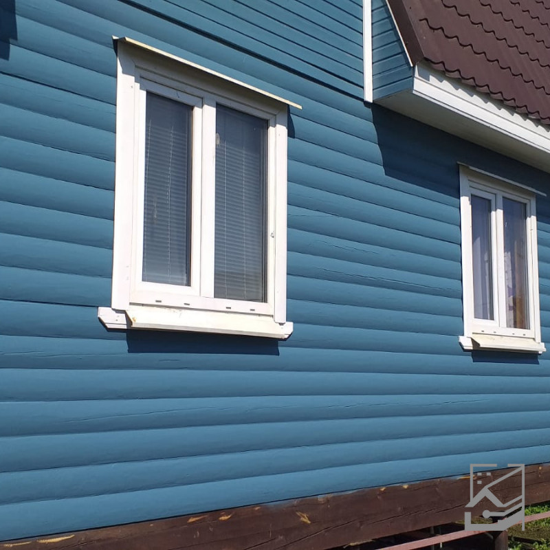 Покраска деревянного дома