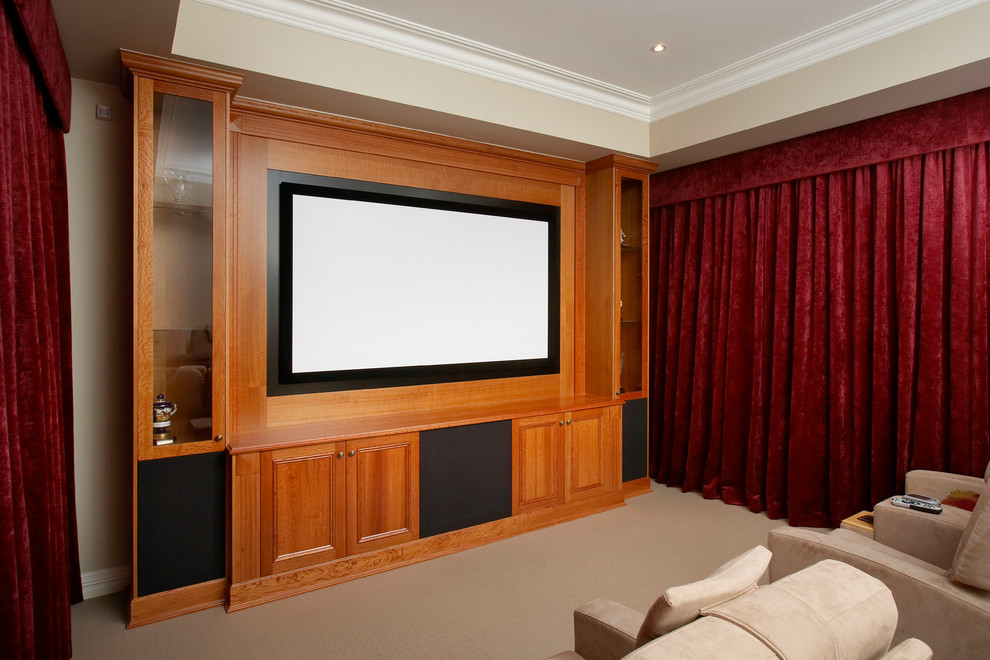 Mid-sized traditional enclosed home theatre in Perth with carpet, a built-in media wall and beige floor.