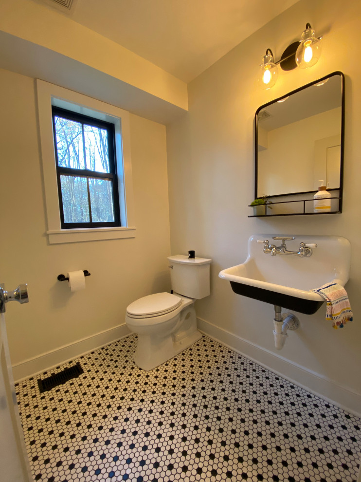 Photo of a small country 3/4 bathroom in Chicago with recessed-panel cabinets, a two-piece toilet, white tile, white walls, ceramic floors, a wall-mount sink, multi-coloured floor, a niche and a single vanity.