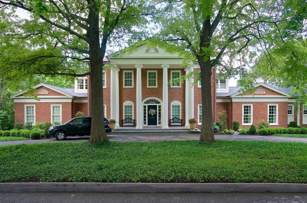 This is an example of a large traditional two-storey brick exterior in Cincinnati.