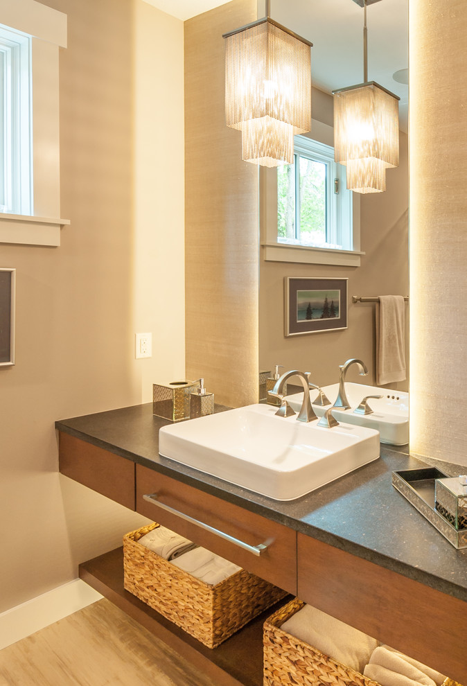 Design ideas for a mid-sized arts and crafts master bathroom in Grand Rapids with a drop-in sink, open cabinets, dark wood cabinets, granite benchtops, an alcove shower, a two-piece toilet, blue tile, glass tile, purple walls and porcelain floors.