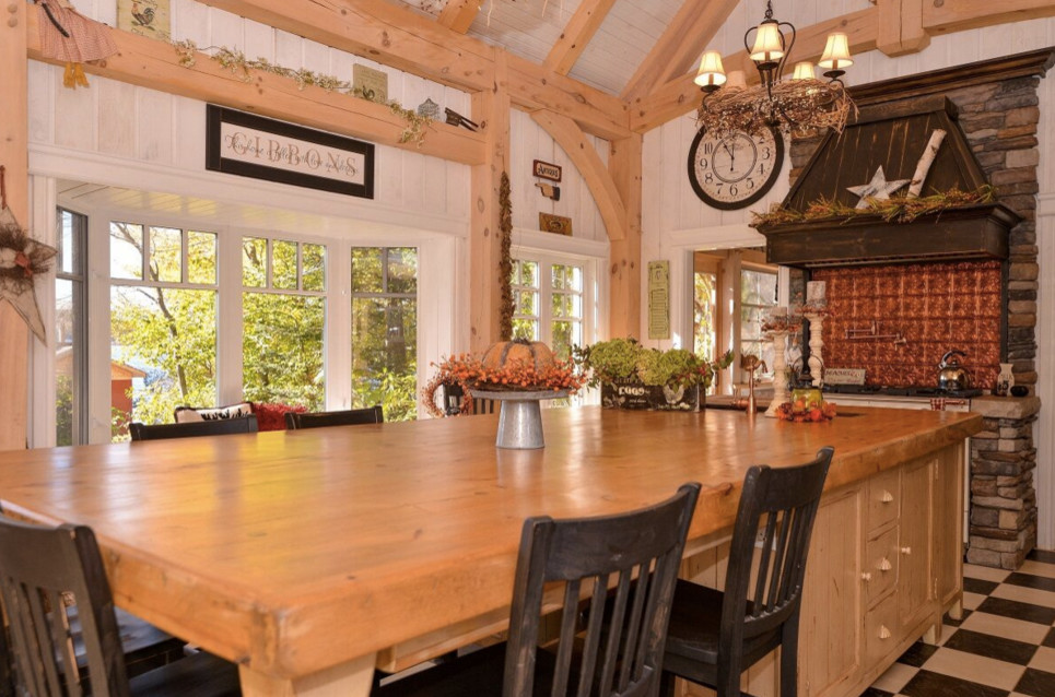 Inspiration for a large rustic galley dark wood floor open concept kitchen remodel in Boston with an undermount sink, shaker cabinets, white cabinets, granite countertops, stainless steel appliances and an island