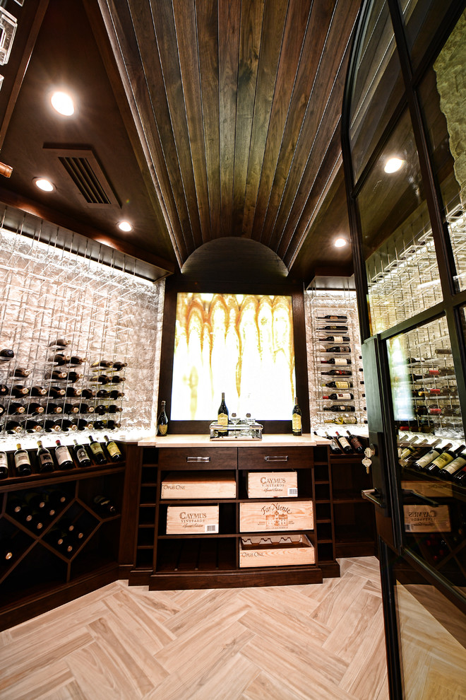 This is an example of a mid-sized transitional wine cellar in Atlanta with porcelain floors, storage racks and multi-coloured floor.