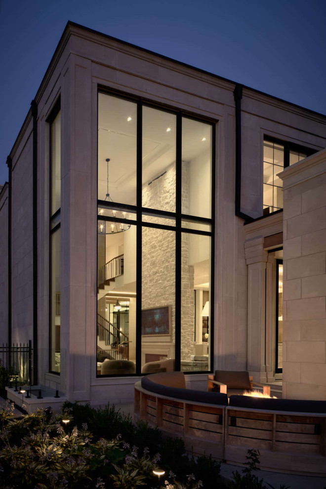 Example of a transitional home design design in Toronto