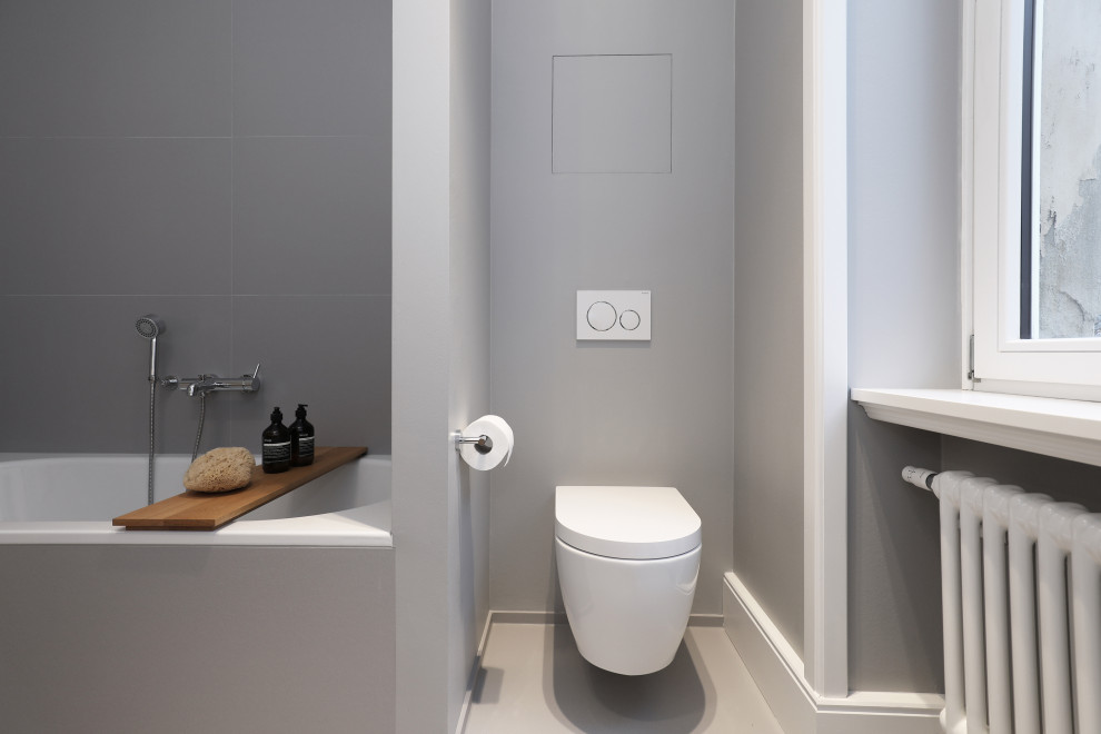 Photo of a large classic bathroom in Frankfurt with white walls, light hardwood flooring and wooden worktops.