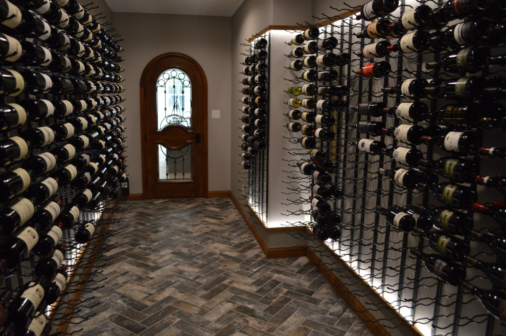 Photo of a mid-sized contemporary wine cellar in Richmond with display racks.