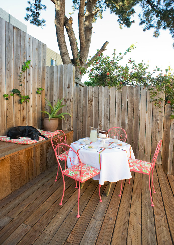 Design ideas for a mid-sized eclectic backyard patio in San Francisco with decking and no cover.