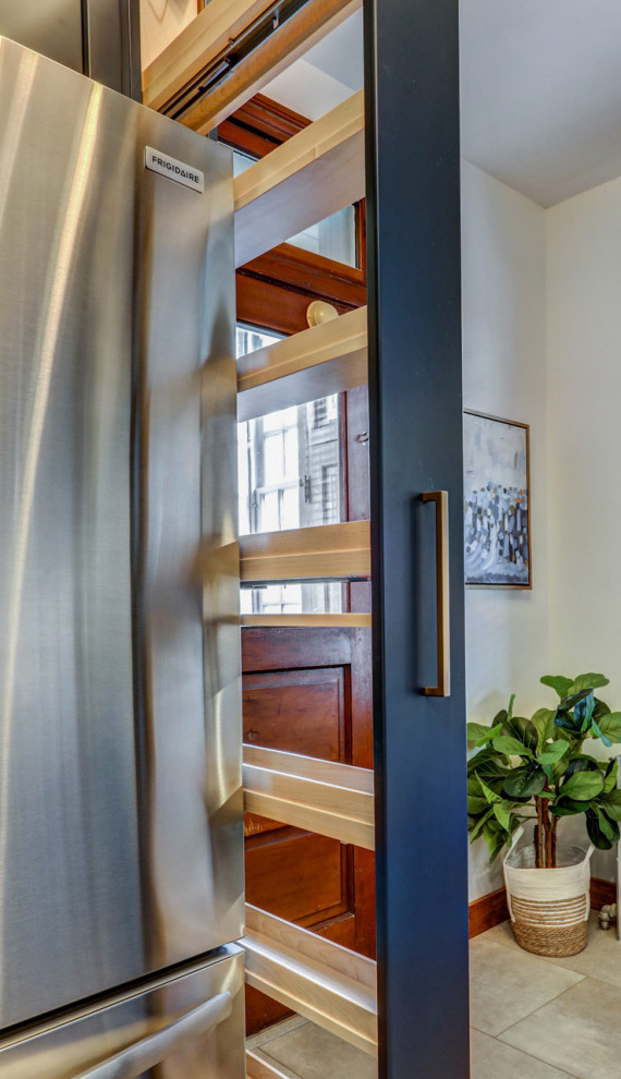 Inspiration for a mid-sized transitional l-shaped vinyl floor and gray floor kitchen pantry remodel with a farmhouse sink, recessed-panel cabinets, blue cabinets, granite countertops, white backsplash, subway tile backsplash, stainless steel appliances, no island and gray countertops