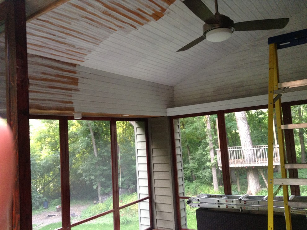 Painting wood ceiling white.