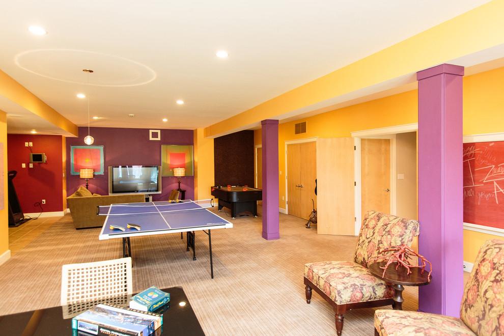 Photo of an expansive contemporary fully buried basement in Boston with yellow walls and carpet.