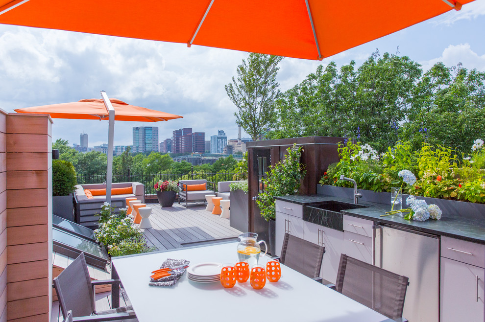 Design ideas for a large contemporary rooftop deck in Boston with an outdoor kitchen and no cover.