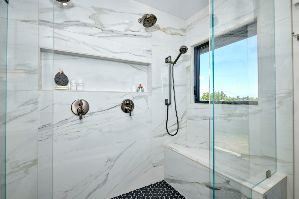 Inspiration for a large master bathroom in Denver with recessed-panel cabinets, light wood cabinets, a freestanding tub, an alcove shower, a one-piece toilet, white tile, porcelain tile, white walls, porcelain floors, an undermount sink, engineered quartz benchtops, black floor, a hinged shower door, white benchtops, a niche, a double vanity, a built-in vanity and wallpaper.