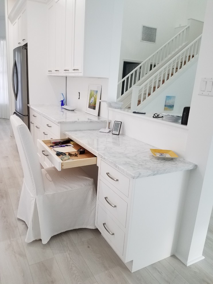 Example of a transitional home design design in Miami