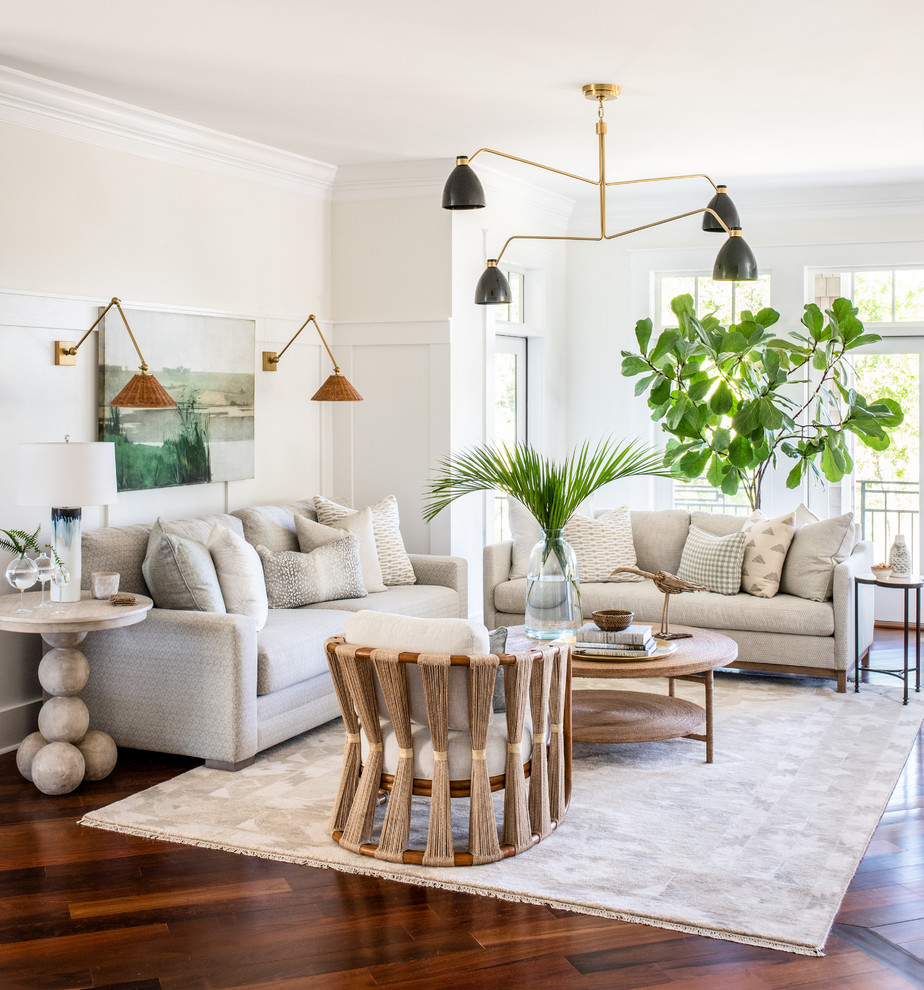 Beach style open concept and formal medium tone wood floor living room photo in Other with white walls