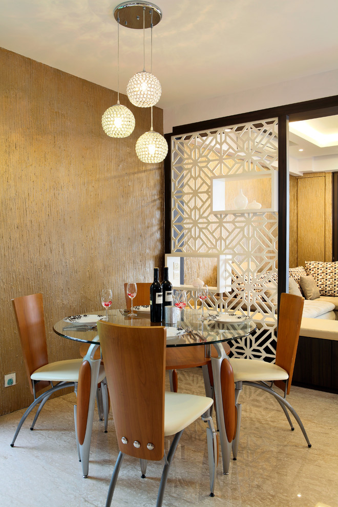 Photo of an eclectic dining room in Singapore with brown walls.