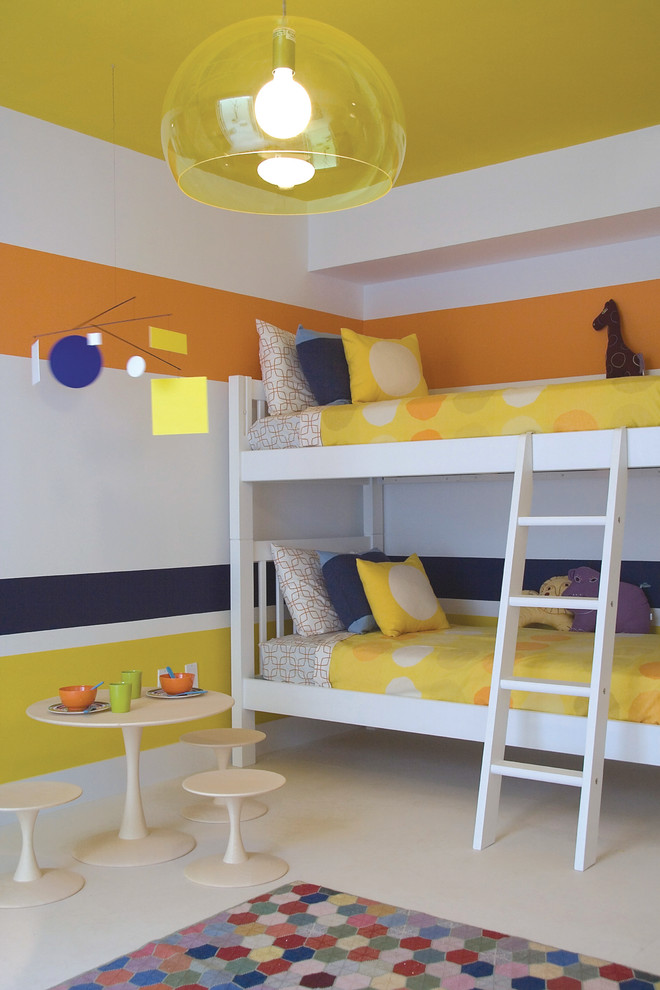 This is an example of a contemporary gender-neutral kids' bedroom for kids 4-10 years old in Miami with multi-coloured walls.