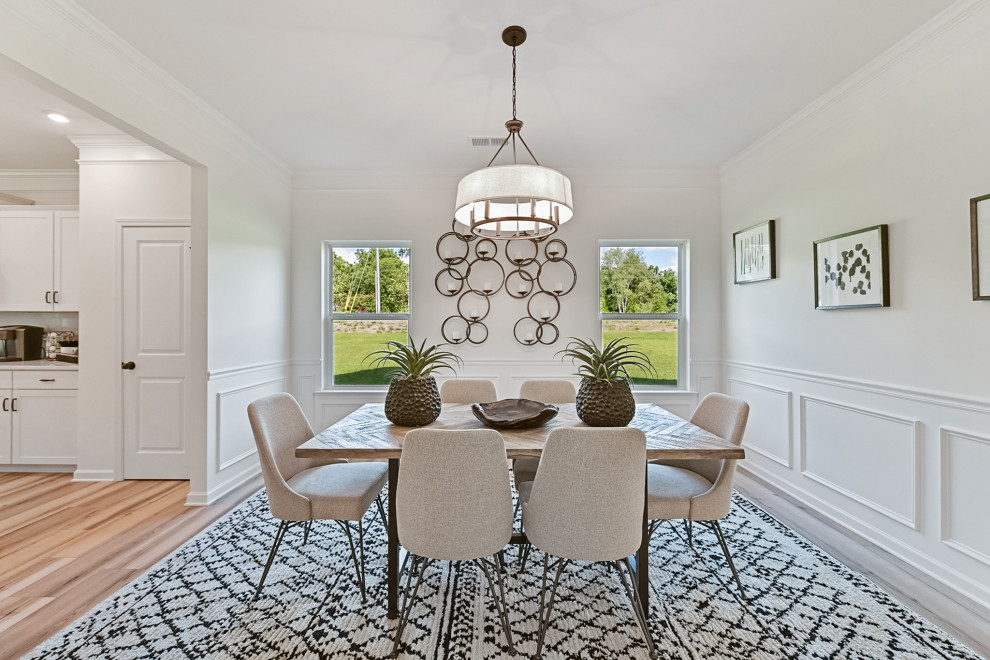 Example of a transitional home design design in Charlotte