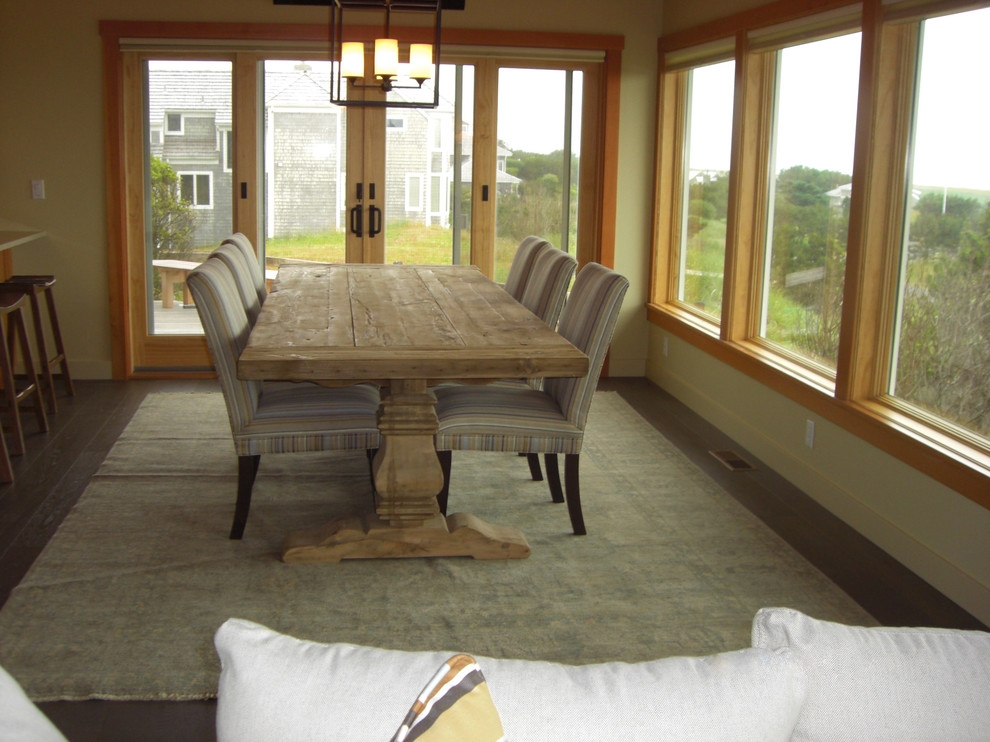 This is an example of a beach style dining room in Portland.