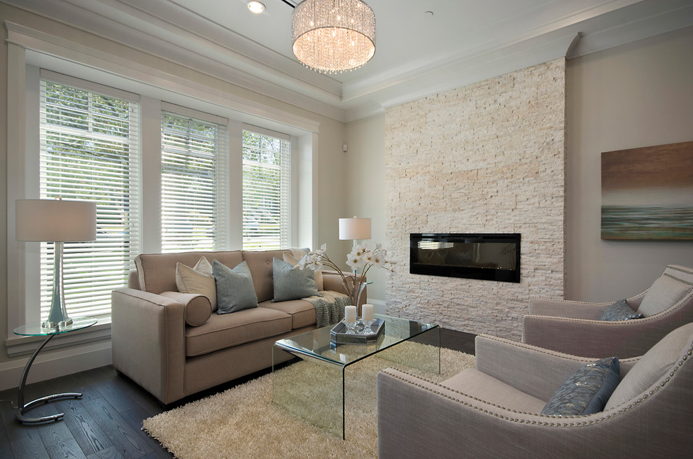 Contemporary formal living room in Vancouver with a ribbon fireplace.