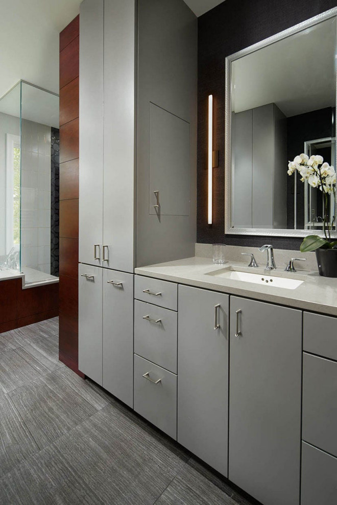 Design ideas for a mid-sized contemporary bathroom in Minneapolis with a built-in vanity, flat-panel cabinets, white cabinets, beige tile, an undermount sink, engineered quartz benchtops and white benchtops.
