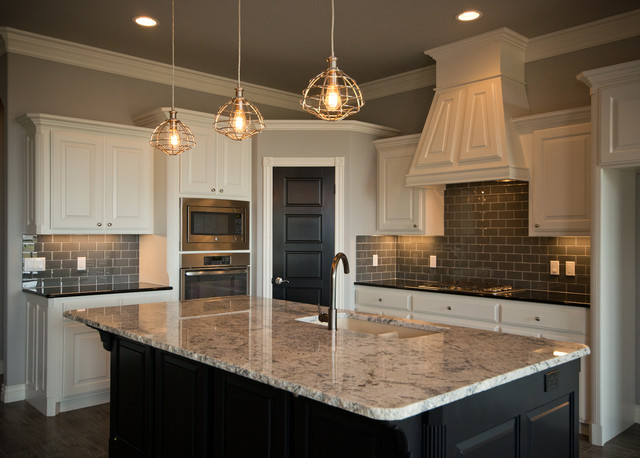 Kitchen with White Cabinets and Dark Island - Transitional ...