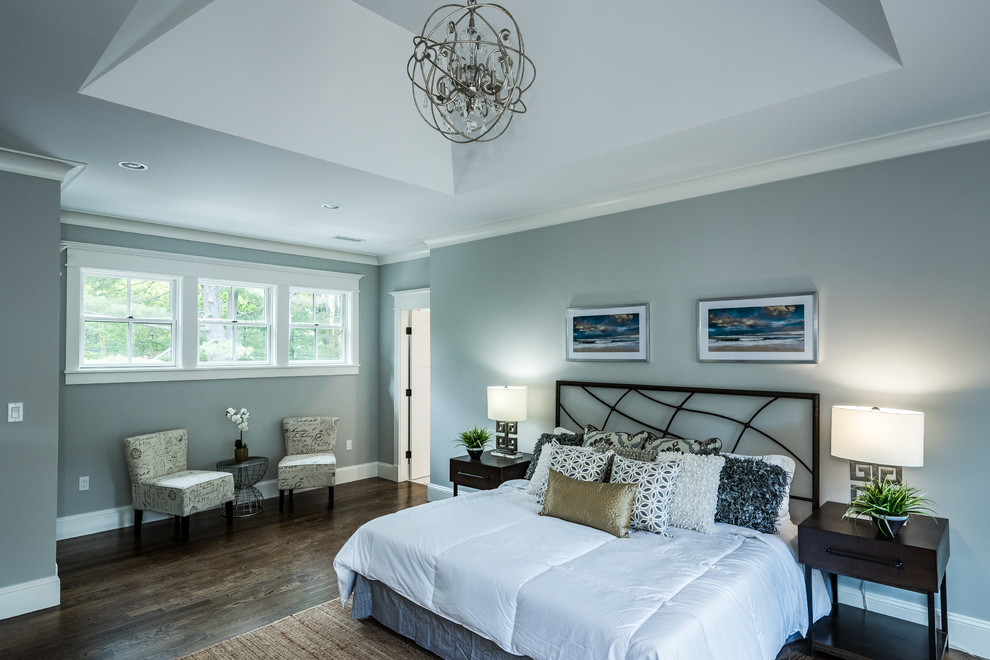 Design ideas for a large contemporary master bedroom in Boston with grey walls, dark hardwood floors, no fireplace and brown floor.