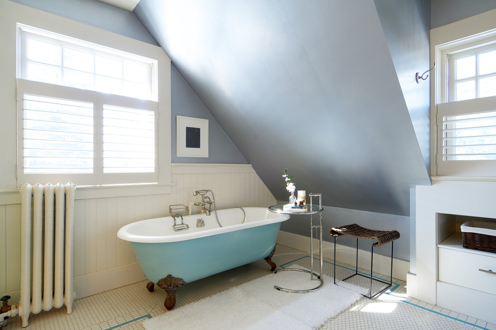 Design ideas for a traditional bathroom in Calgary with a claw-foot tub.