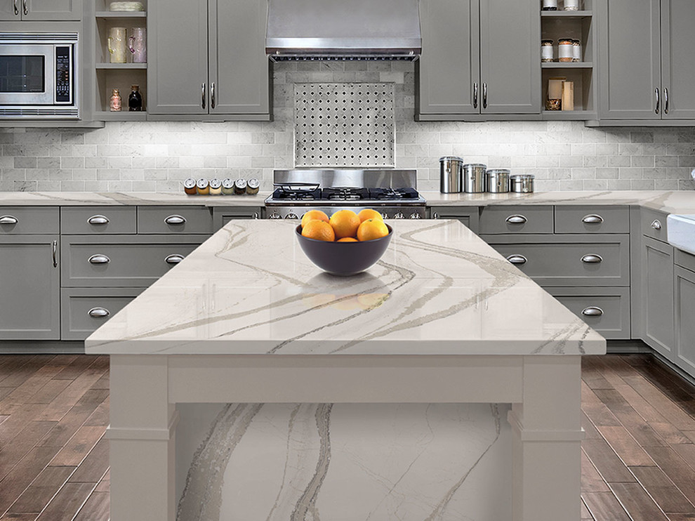 Example of a mid-sized transitional u-shaped dark wood floor and brown floor eat-in kitchen design in Baltimore with a double-bowl sink, raised-panel cabinets, white cabinets, wood countertops, gray backsplash, subway tile backsplash, colored appliances and an island