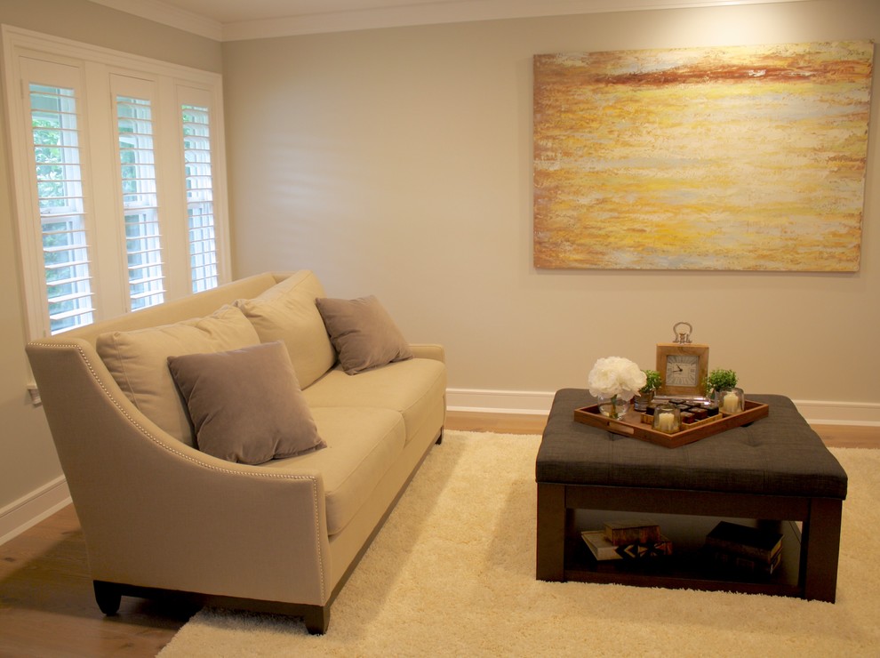 Inspiration for a large contemporary open concept light wood floor living room remodel in Orange County with gray walls