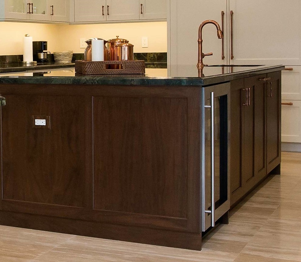 Example of a large transitional u-shaped light wood floor open concept kitchen design in Miami with a farmhouse sink, shaker cabinets, stainless steel appliances, an island, white cabinets, granite countertops, metallic backsplash and mosaic tile backsplash