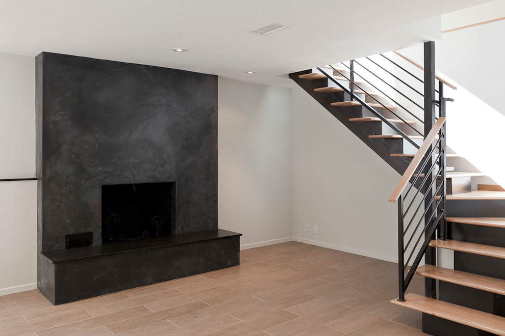 Design ideas for a mid-sized modern wood l-shaped staircase in Portland with open risers.