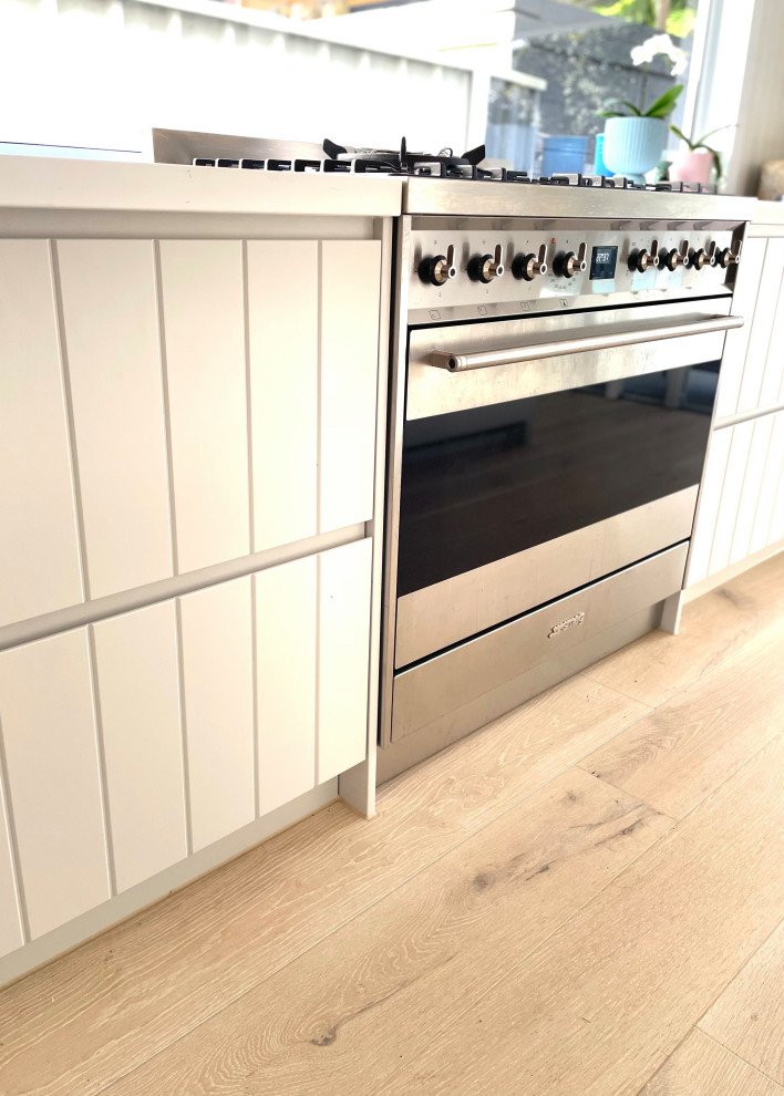 Photo of a beach style kitchen in Brisbane.