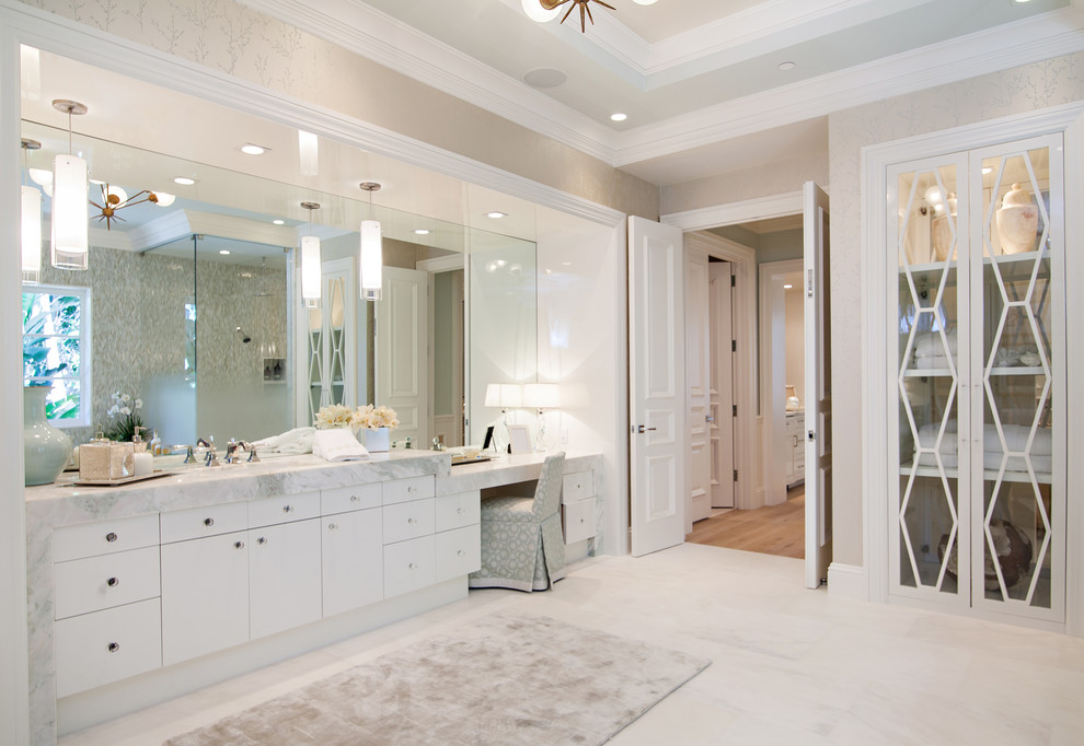 Huge transitional master white tile and stone slab marble floor alcove bathtub photo in Miami with flat-panel cabinets, white cabinets, an undermount sink and marble countertops