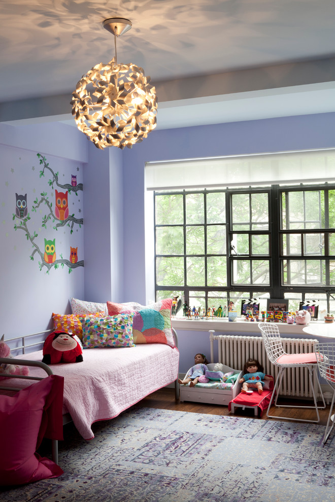Inspiration for a bedroom contemporary kids' bedroom remodel in New York with purple walls