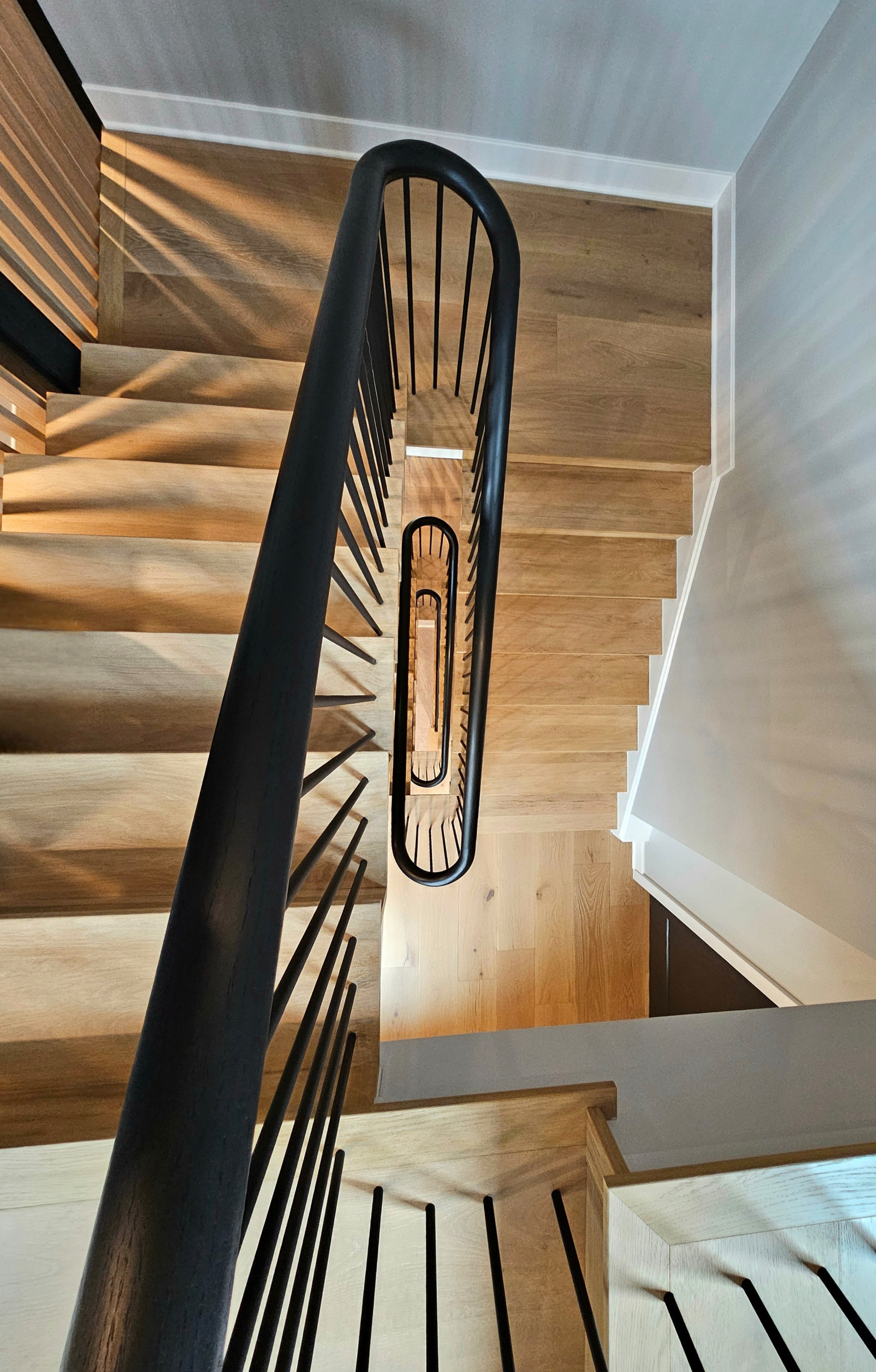 115_Stunning Continuous Rail System on 3 Story Floating Stairs; Arlington, VA 22