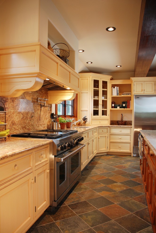 Design ideas for a traditional kitchen in Santa Barbara with slate floors.