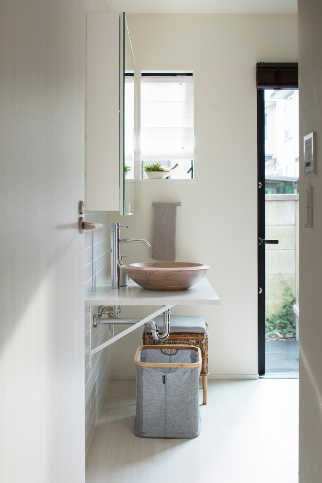 Inspiration for a powder room remodel in Tokyo Suburbs