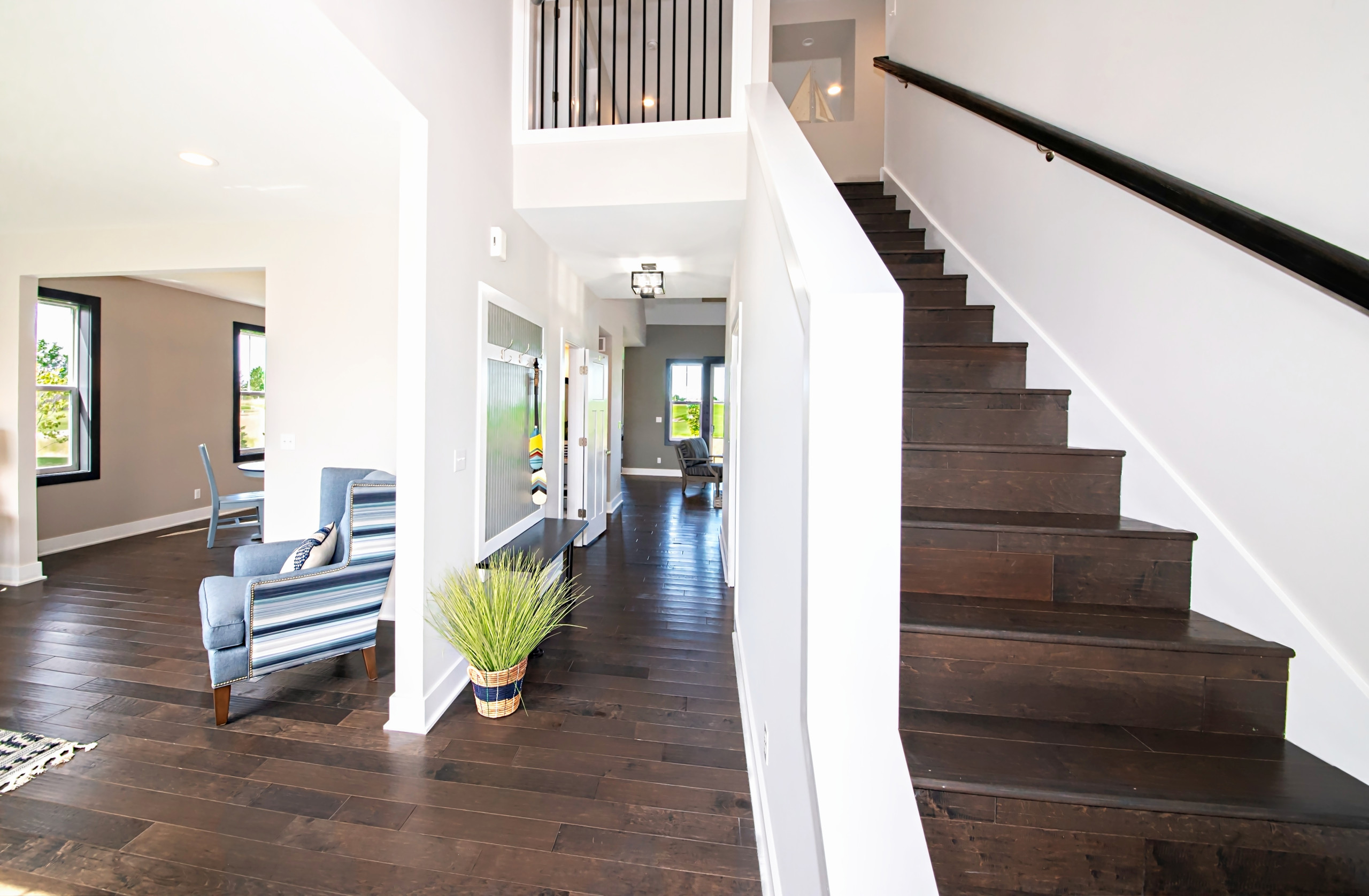 Wooden mixed material railing staircase photo in Other with wooden risers