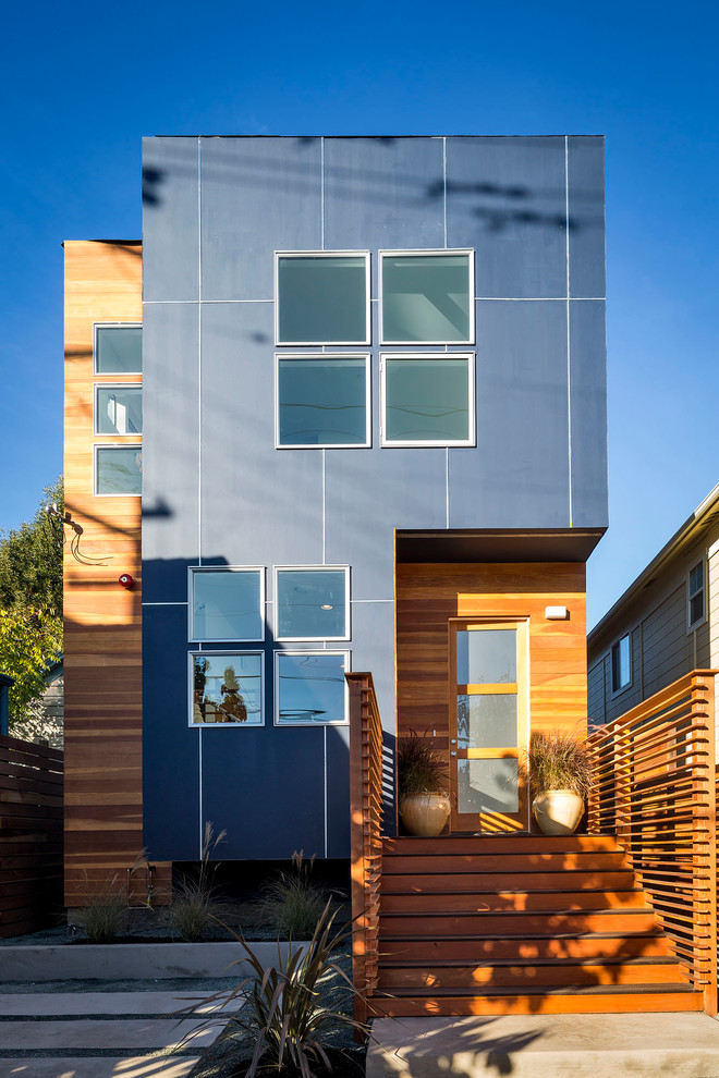 Inspiration for a contemporary two-storey exterior in San Francisco with mixed siding.