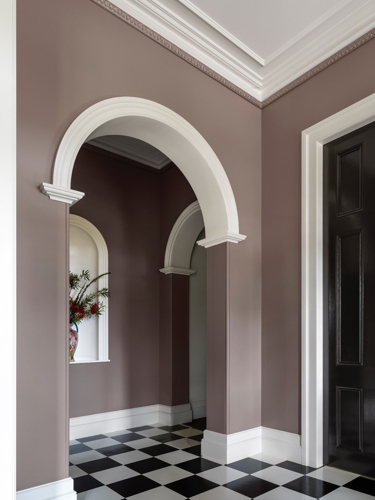 Inspiration for a large country foyer in Sydney with brown walls, a single front door and a black front door.