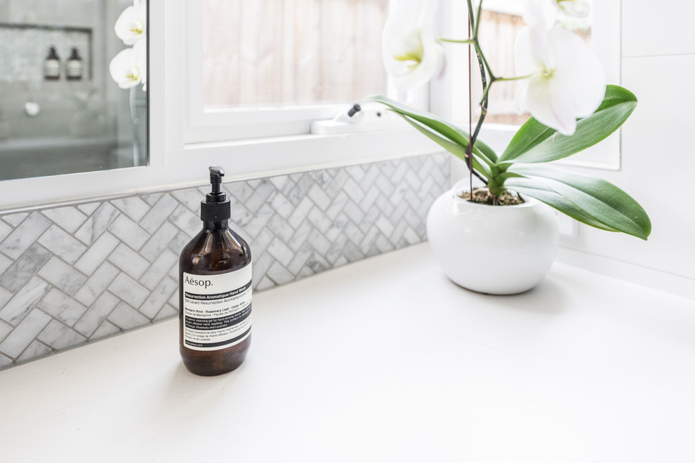 This is an example of a contemporary bathroom in Melbourne with ceramic floors and an undermount sink.
