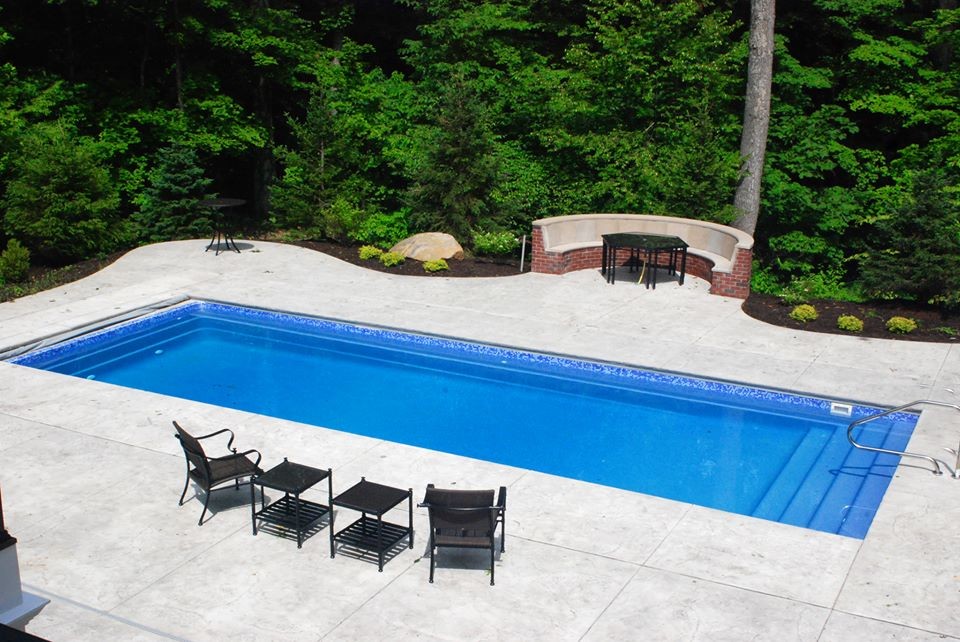Mid-sized backyard rectangular pool photo in Indianapolis