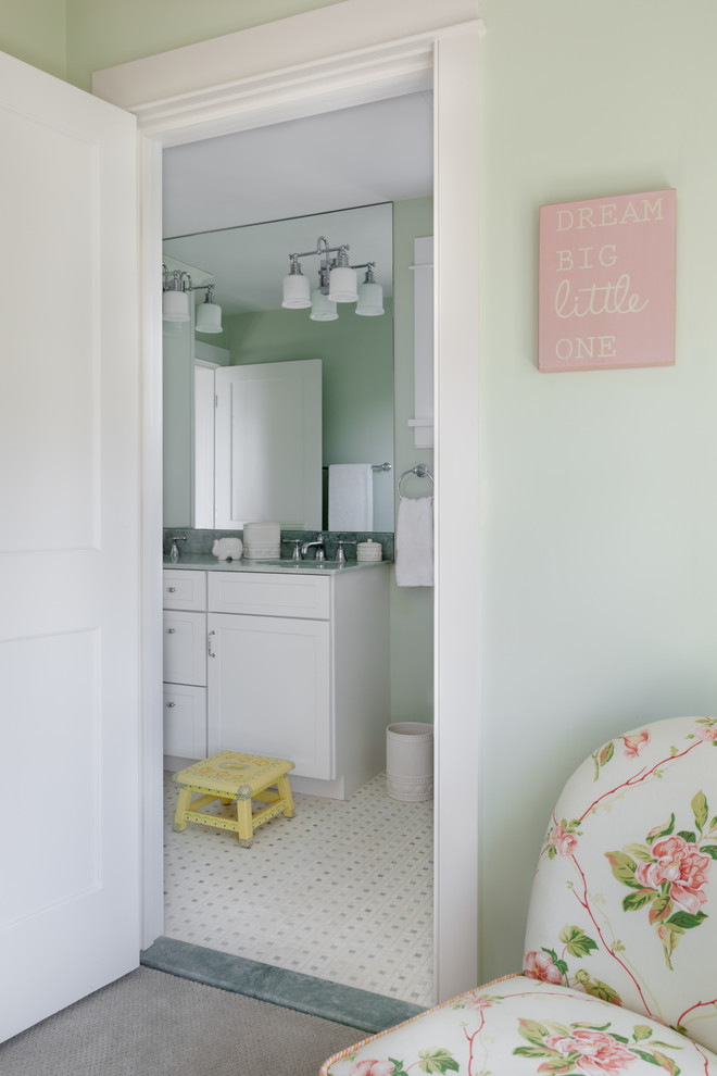 Photo of a mid-sized contemporary nursery for girls in Boston with green walls, carpet and grey floor.
